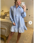 Blue color Oversized shirt dress in pop pattern fabric in ruffle hem design