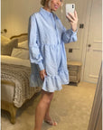 Blue color Oversized shirt dress in pop pattern fabric in ruffle hem design