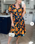 Oversized puff sleeve midi dress in Yellow Floral Print