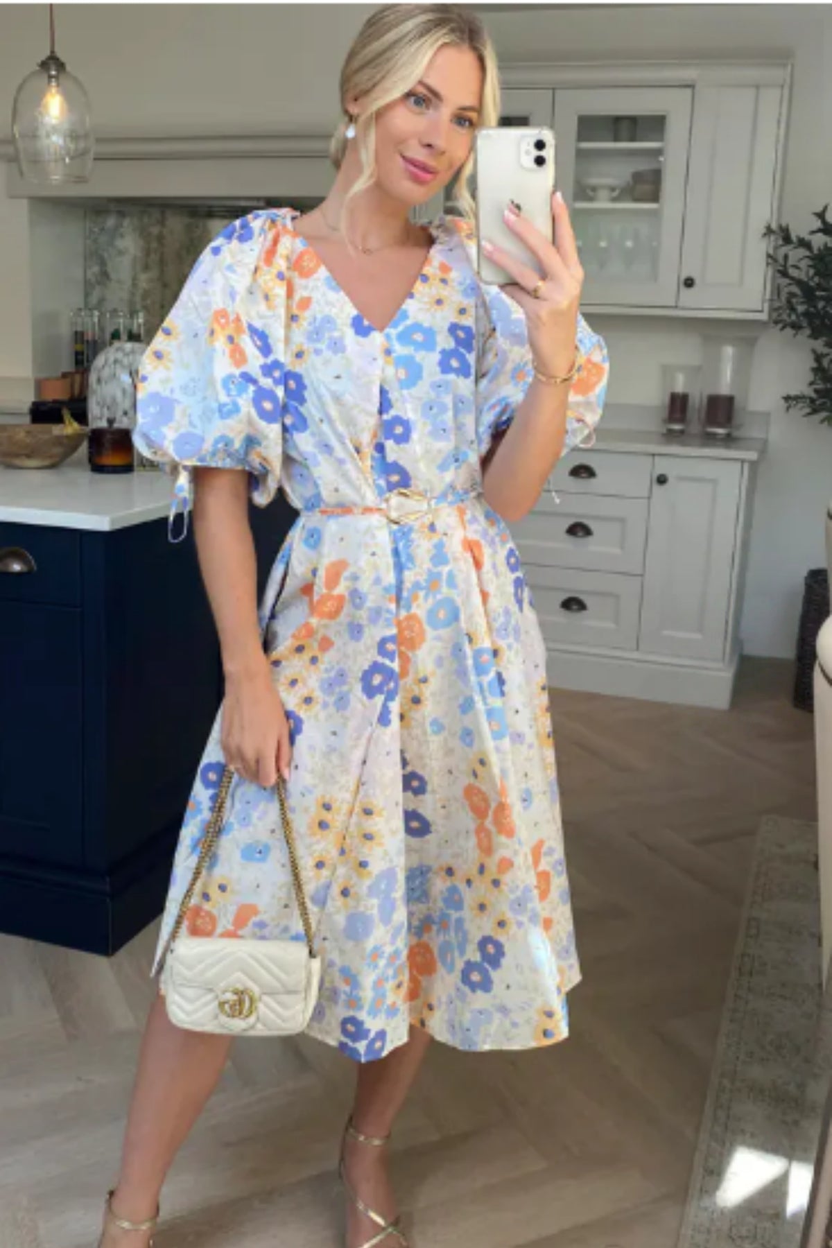Oversized puff sleeve midi dress in Multi color floral print