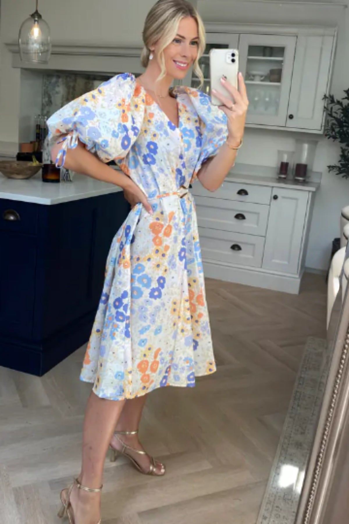 Oversized puff sleeve midi dress in Multi color floral print