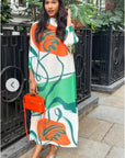 Multi Color Print Pleated Dress in three quarter sleeves in green and orange