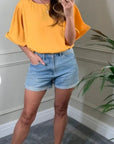 Top with Oversized Ruffle Sleeves in Mustard Yellow