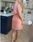 Sleeveless Mini Wrap Dress in peach pink color