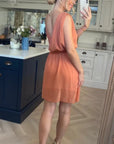 Sleeveless Mini Wrap Dress in coral color