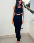 Knitted bodycon style vest top with tie up design and midi pencil skirt co-ords set in black