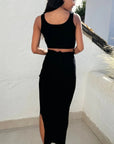 Knitted bodycon style vest top with tie up design and midi pencil skirt co-ords set in black