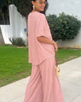 Oversized comfort stretch-jersey top and Relaxed-fit trousers in Pink