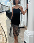 Long fringed tassel detail hem bodycon knit dress in black