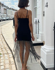 Long fringed tassel detail hem bodycon knit dress in black