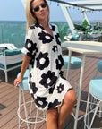 Floral print cotton blend linen holiday dress in black
