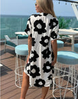 Floral print cotton blend linen holiday dress in black