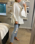 Bell sleeve shirt with ties in white