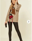 Un-finished tassel fringed knitted jumper