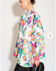 Wild Bloom multi color print oversized shirt with tie up bow design in white