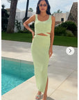 Knitted bodycon style vest top with tie up design and midi pencil skirt co-ords set in green