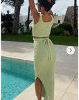 Knitted bodycon style vest top with tie up design and midi pencil skirt co-ords set in green