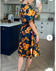 Oversized puff sleeve midi dress in Yellow Floral Print