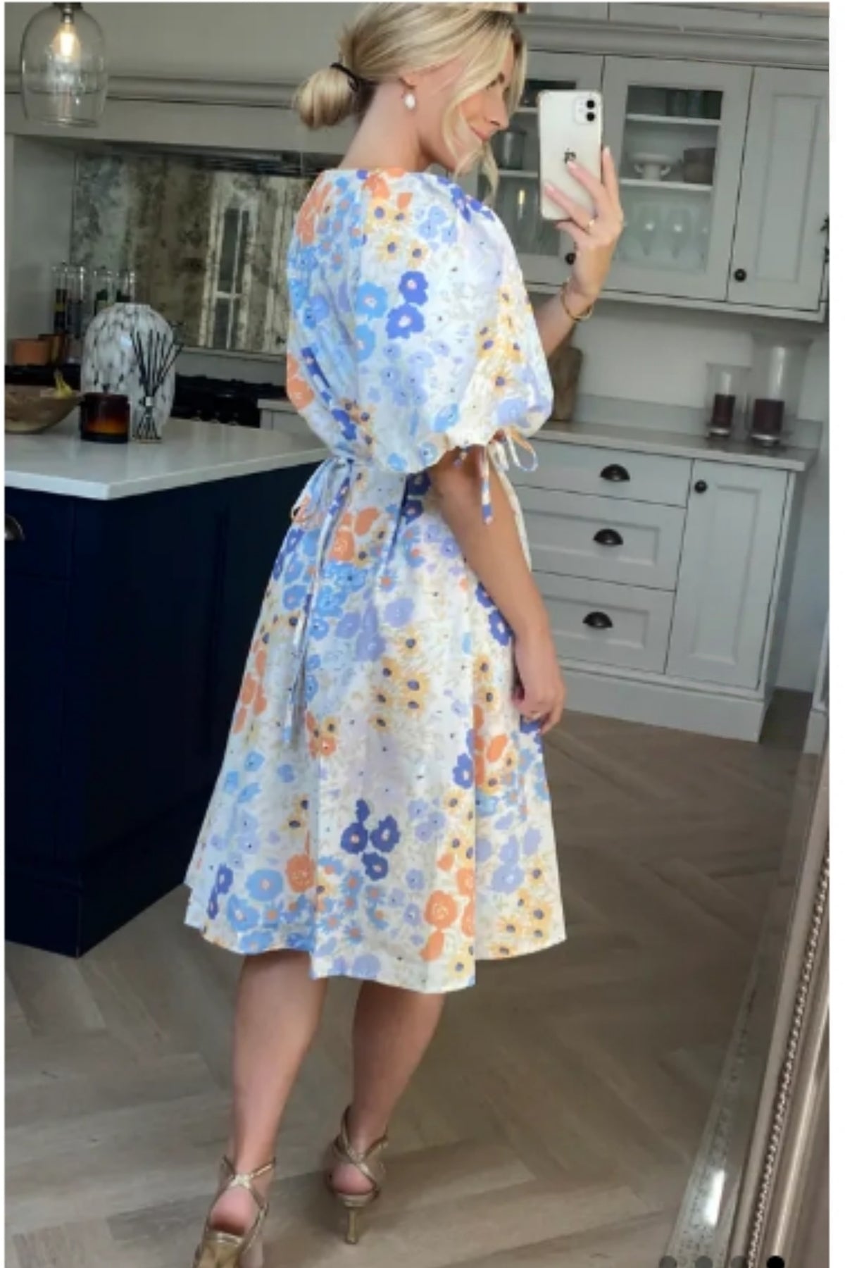 Oversized puff sleeve midi dress in Multi color floral print
