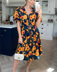 Oversized puff sleeve midi dress in Yellow Floral Print