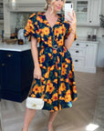 Oversized puff sleeve midi dress in Yellow Floral Print
