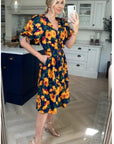 Oversized puff sleeve midi dress in Yellow Floral Print