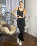 Knitted bodycon style vest top with tie up design and midi pencil skirt co-ords set in black
