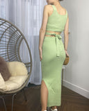 Knitted bodycon style vest top with tie up design and midi pencil skirt co-ords set in green
