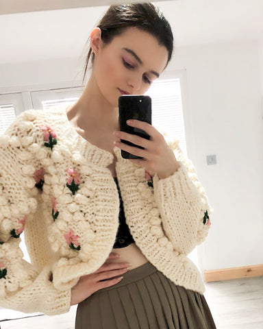 Floral design hand knit cardigan in cream color