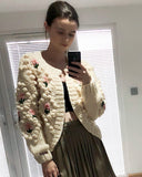 Floral design hand knit cardigan in cream color