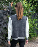 Knitted cardigan style bomber jacket with patch