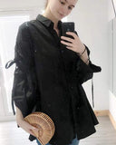 Oversized Ballon sleeves with tie up cotton blend shirt in black
